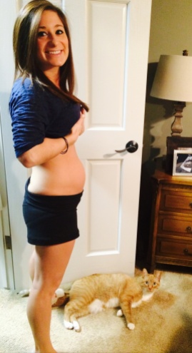 15 Weeks, 5 Days (January 8, 2014). I feel like my little belly is really shaping up to look pretty darn pregnant. I know that's the point, but I was so surprised when I saw this picture, I made my husband examine it... at which point he reminded me that he knows because he took the photo. PS: taken in the morning.